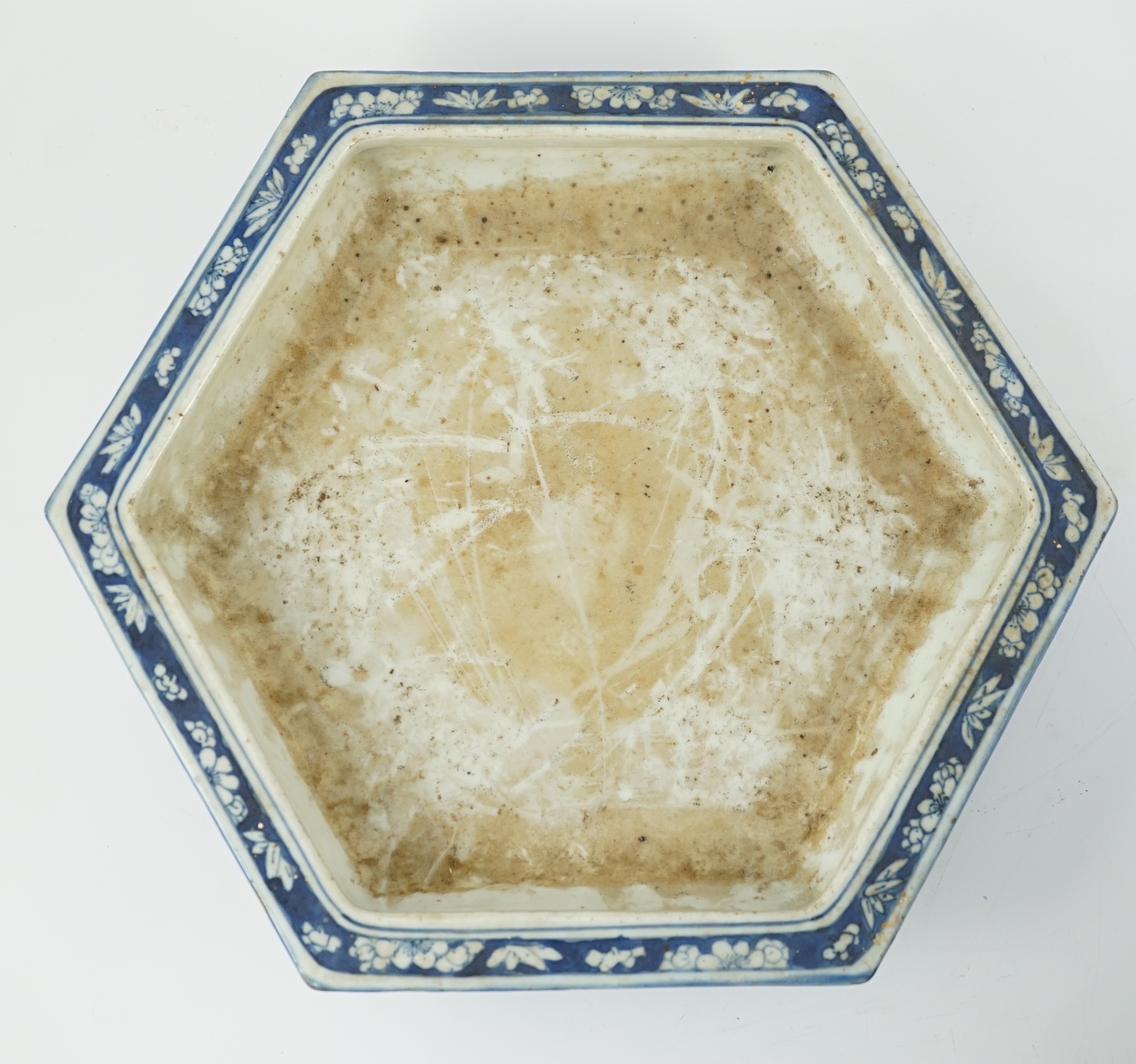 A Chinese hexagonal blue and white planter and underdish, 19th century, 35cm wide, two rim chips